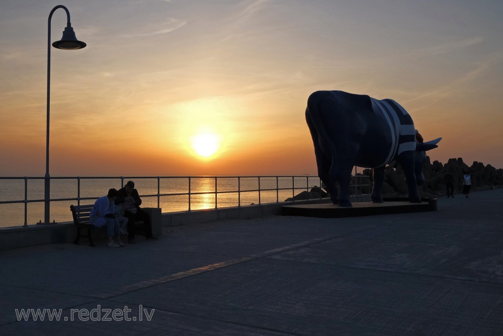 Sculpture "Cow Seaman" in Sunset