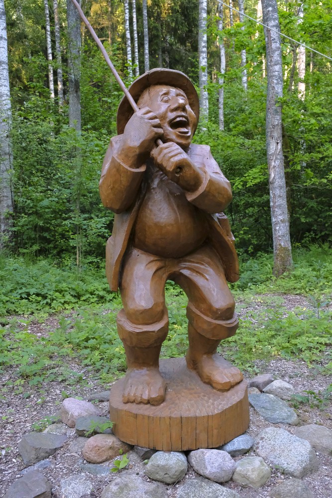 Fisherman Sculpture In Cīrava Forest Park