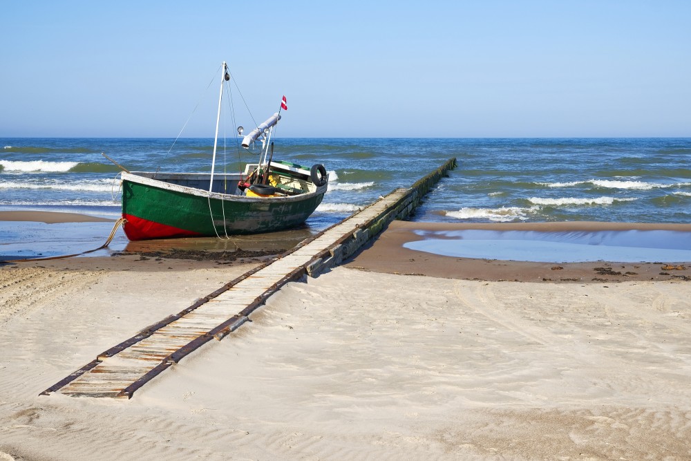 Fishing Boat By The Sea