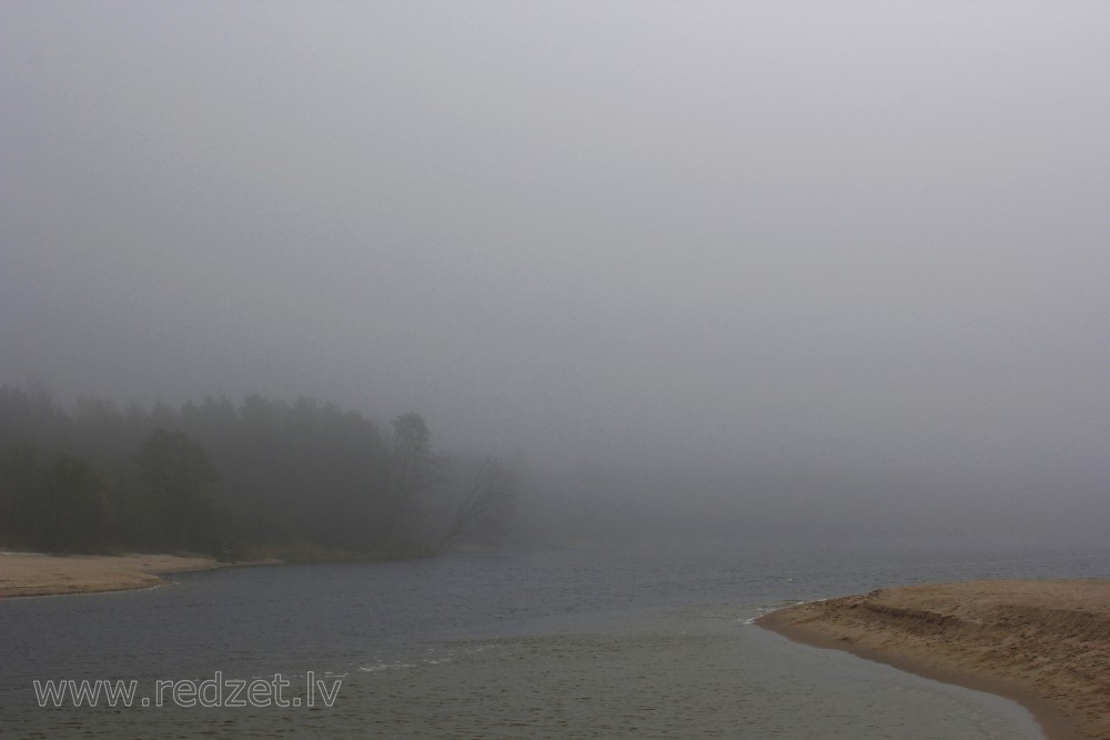 River Gauja in the Fog in late Autumn