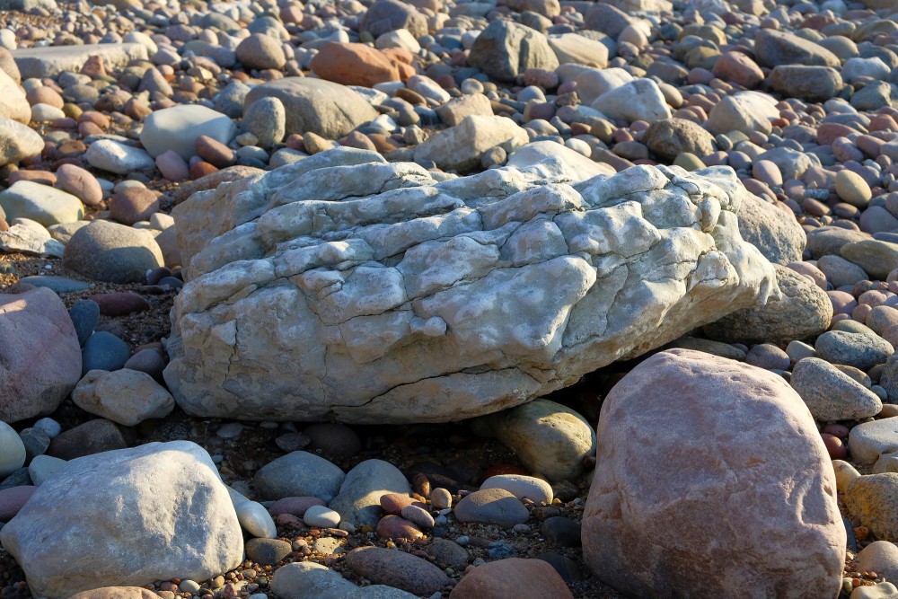 Stones at Coastline of Baltic Sea at Sunset
