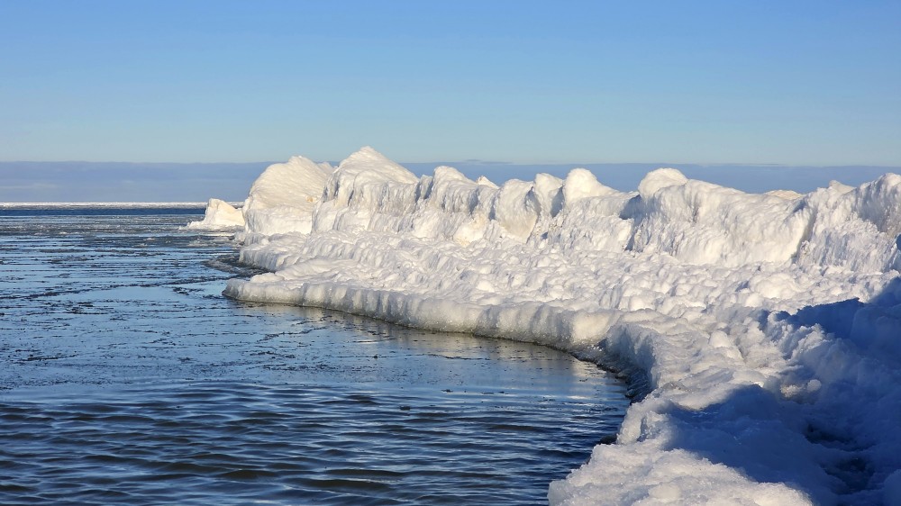 Winter landscape with ice wall and snow on the Baltic Sea coast