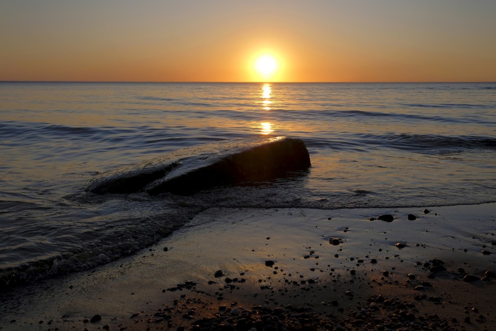 Sunset in the Baltic Sea, Stone in the sea