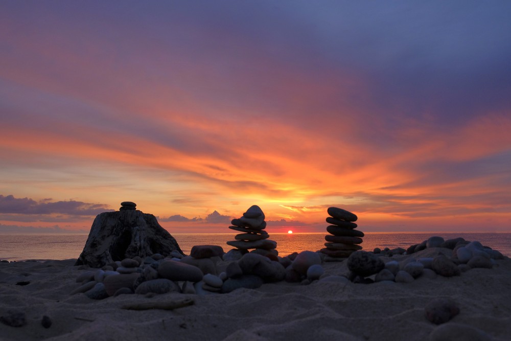 Stacks of Rocks at Sunset on the Seashore