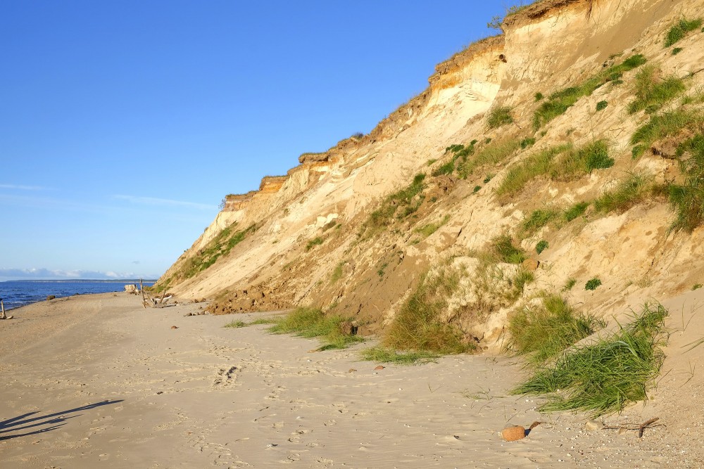 Steep coastal cliff with sea view