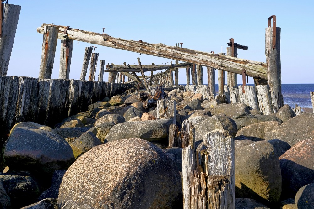 Details of the Old Pier of Šventoji with wood and stones