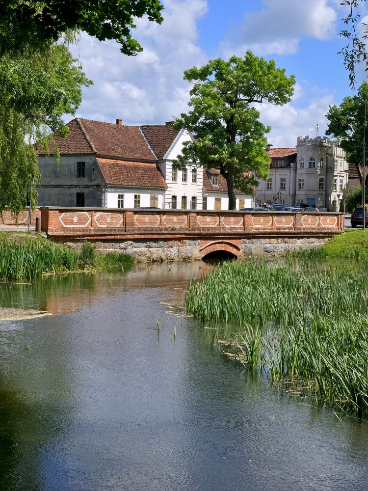 Alekšupīte river bridge at Lutheran church