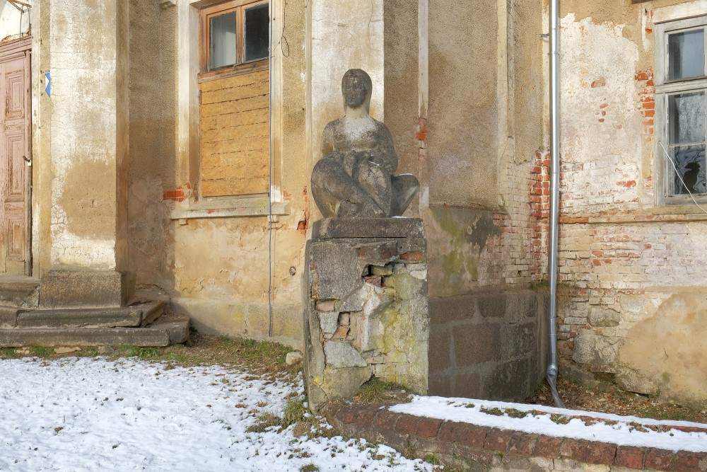 Sculpture At The Entrance Of Šķēde Manor House
