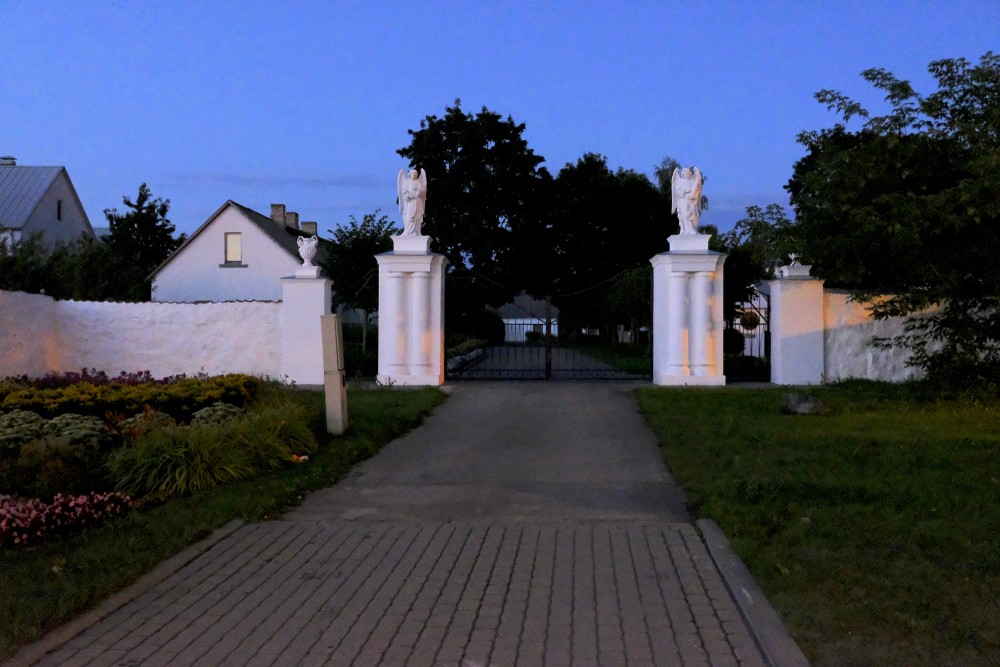 Gate of Viļani Catholic Church at night