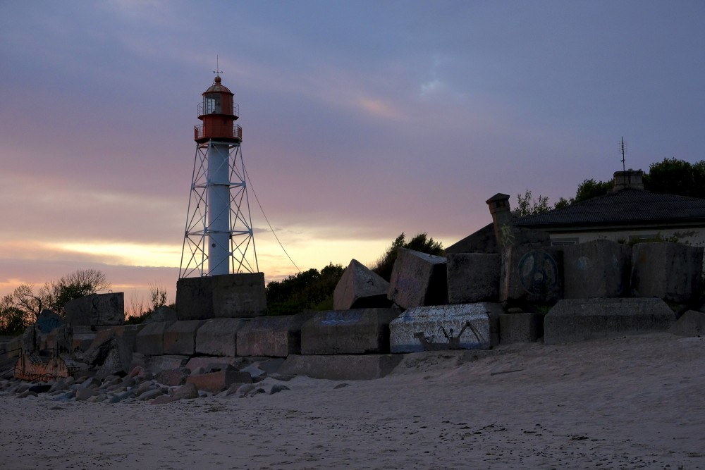 Pape Lighthouse At Sunset