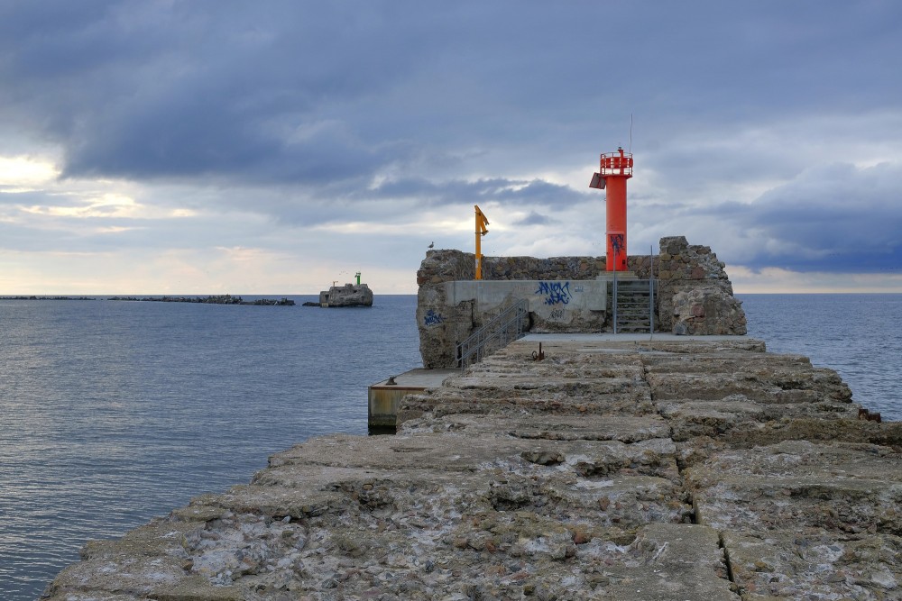 Navigation beacon at the end of Liepaja Northern Breakwater by the Baltic Sea