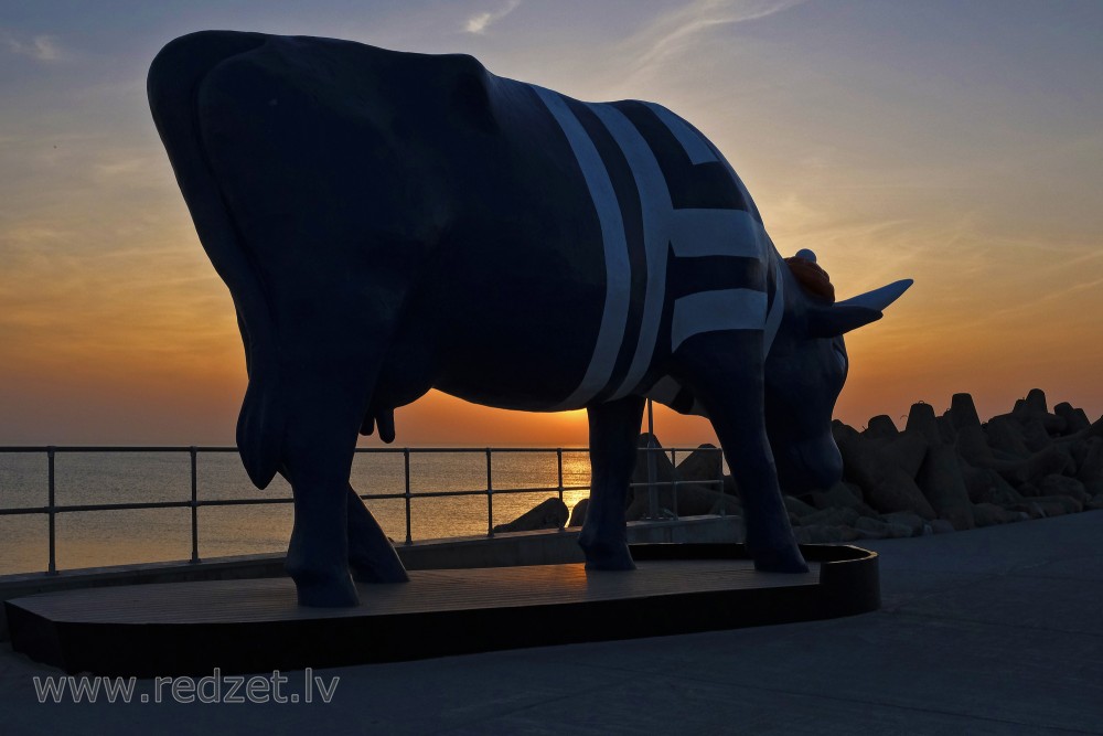 Sculpture "Cow Seaman" in Sunset