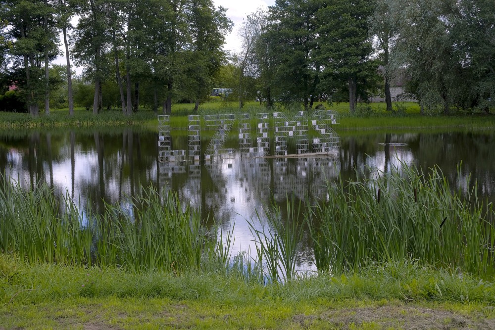 Sign "Lizums" in Lizums Pond