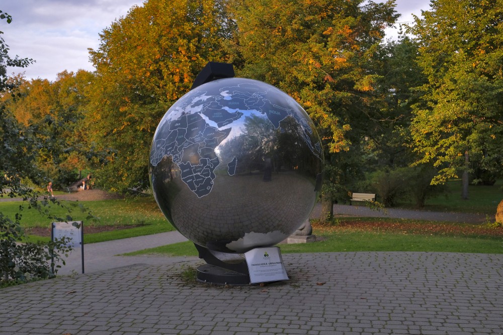 Decorative globe sculpture in Liepaja Seaside Park during autumn