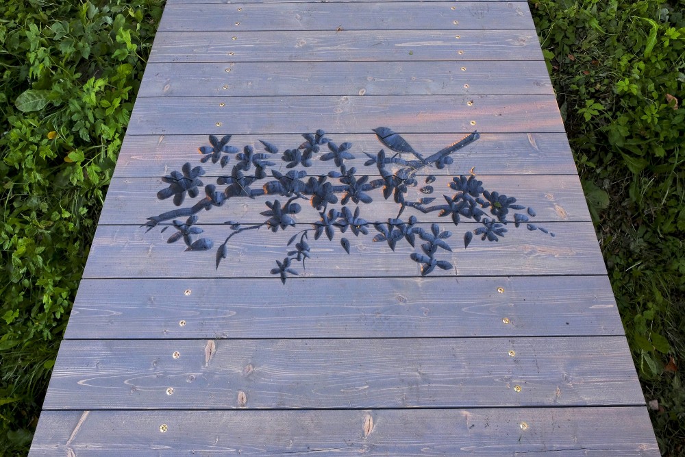 Wood Carving on the Footbridge - S. Eisenstein Communications Center